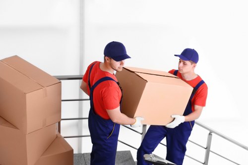 House removal team preparing furniture for a move in Aperfield