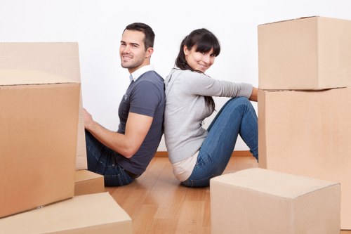 Loading furniture into a removals van for an Aperfield property move