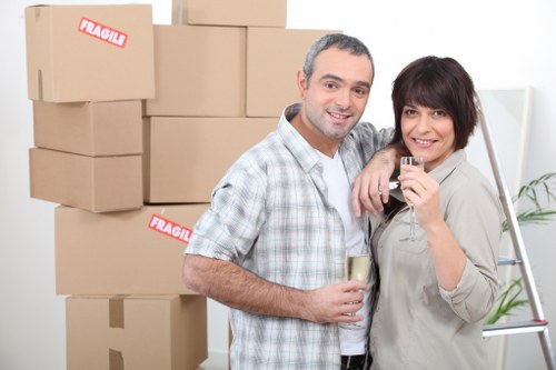 Delivery team handling goods with care before completion